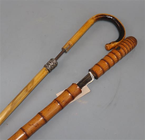 A bamboo swordstick and a cane swordstick, early 20th century